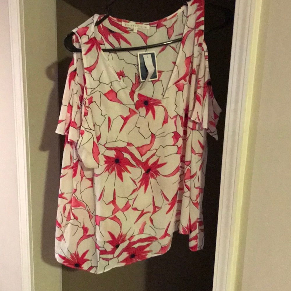 Pink and white cold shoulder shirt.